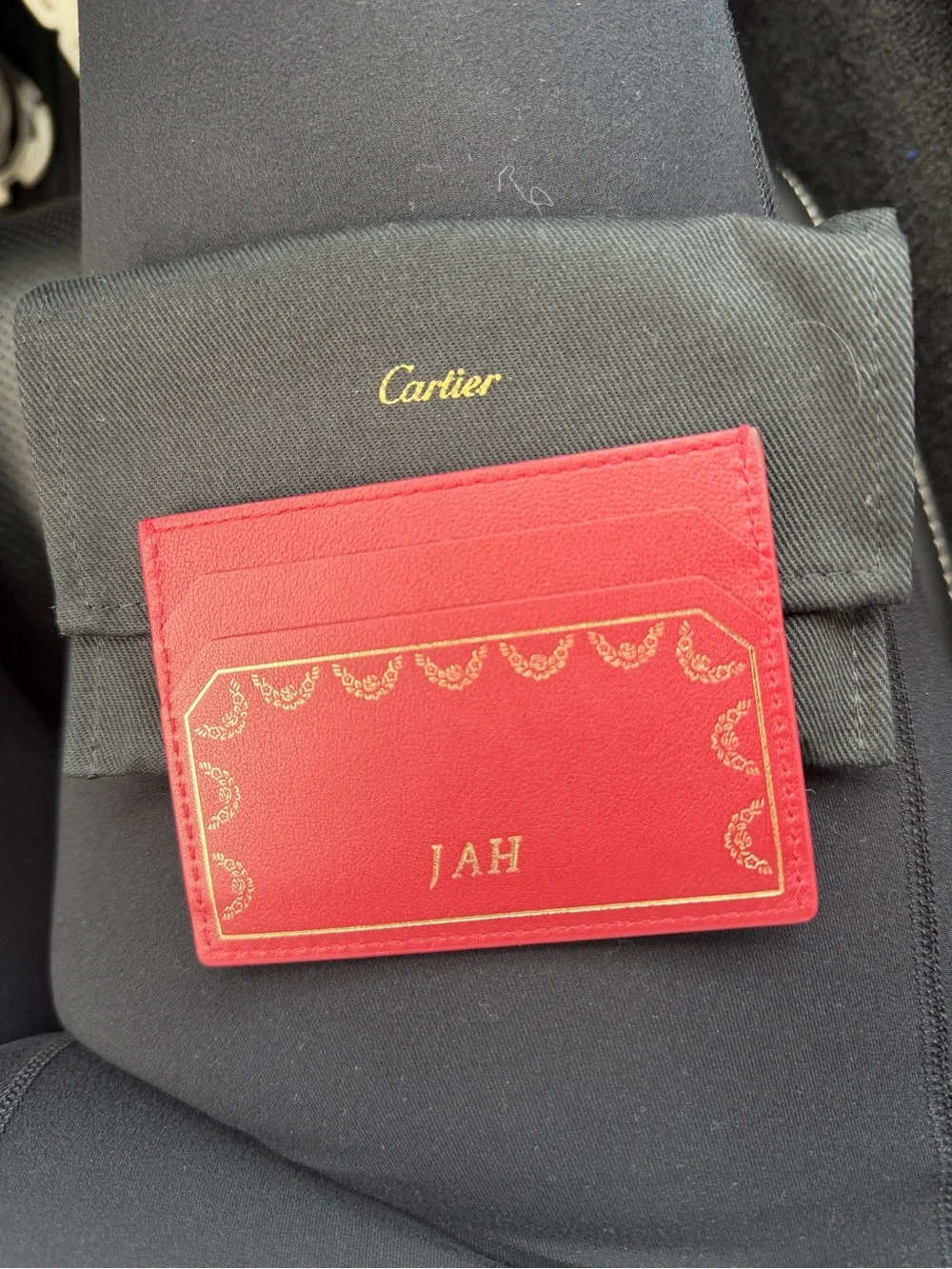 Cartier Red Leather Card Case with Gold Detailing